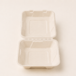 Compostable single-compartment bagasse clamshell containers for burgers, rice meals and takeaway food packaging.